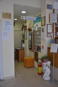 a room with a pharmacy with a pharmacyacistacistacistacist at Hotel Tiziana in Rimini