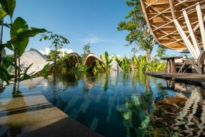 Kolam renang di atau di dekat Ulaman Eco Luxury Resort
