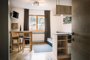 Kuchyň nebo kuchyňský kout v ubytování Apartments Gletscherblick