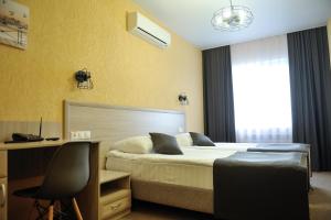 Cama o camas de una habitación en Oblaka Hotel