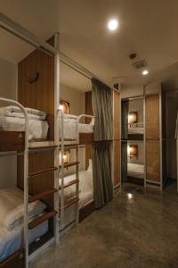 Ein Bett oder Betten in einem Zimmer der Unterkunft Hidden Garden Hostel