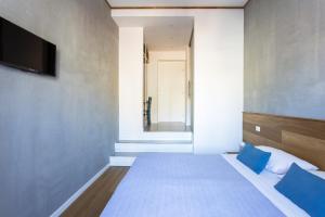 Postel nebo postele na pokoji v ubytování Canceddi Rooms