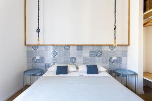 Postel nebo postele na pokoji v ubytování Canceddi Rooms