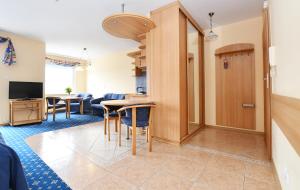 TV a/nebo společenská místnost v ubytování Apartament 14B