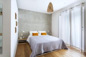 Postel nebo postele na pokoji v ubytování Canceddi Rooms