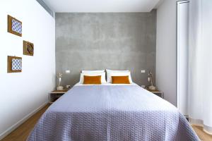 Postel nebo postele na pokoji v ubytování Canceddi Rooms