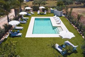 The swimming pool at or close to Residence I Faraglioni