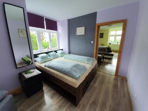 Postel nebo postele na pokoji v ubytování Apartmán Helenka Stará Morava Tatranská Lomnica