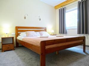Postel nebo postele na pokoji v ubytování Nowa Fregata - pokoje nad morzem