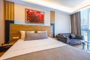 Postel nebo postele na pokoji v ubytování RUSH HOTEL İSTANBUL