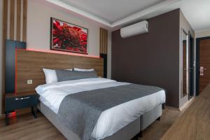 Postel nebo postele na pokoji v ubytování RUSH HOTEL İSTANBUL