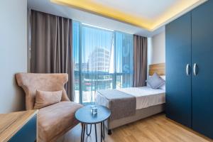 Postel nebo postele na pokoji v ubytování RUSH HOTEL İSTANBUL