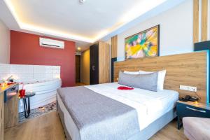 Postel nebo postele na pokoji v ubytování RUSH HOTEL İSTANBUL