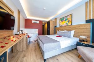 Postel nebo postele na pokoji v ubytování RUSH HOTEL İSTANBUL