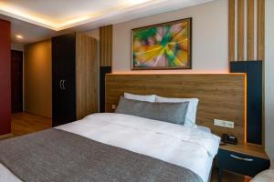 Postel nebo postele na pokoji v ubytování RUSH HOTEL İSTANBUL