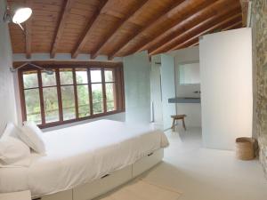 Cama o camas de una habitación en Casa Rural Madariaga