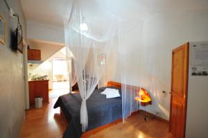 Letto o letti in una camera di SAS L' Ilot Vert