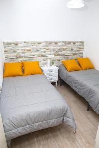 Postel nebo postele na pokoji v ubytování Apartamento Domínguez