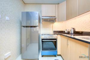 Gallery image of Vibrant 1BR at Pantheon Boulevard Jumeirah Village Circle by Deluxe Holiday Homes in Dubai