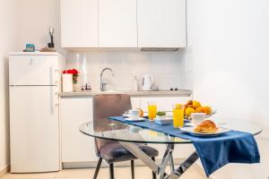 Kuchyň nebo kuchyňský kout v ubytování Apartments Vito