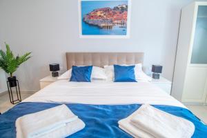 Postel nebo postele na pokoji v ubytování Apartments Vito
