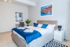 Postel nebo postele na pokoji v ubytování Apartments Vito