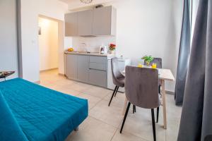 Kuchyň nebo kuchyňský kout v ubytování Apartments Vito