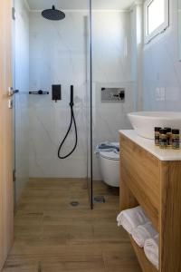 Vannituba majutusasutuses s u e ñ o - studios and apartments, with shared pool