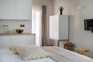 Voodi või voodid majutusasutuse s u e ñ o - studios and apartments, with shared pool toas