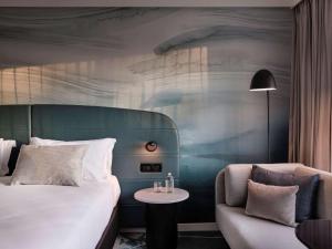Postel nebo postele na pokoji v ubytování Novotel Tainui Hamilton