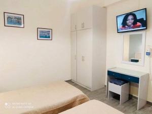 TV a/nebo společenská místnost v ubytování Moros Apartments
