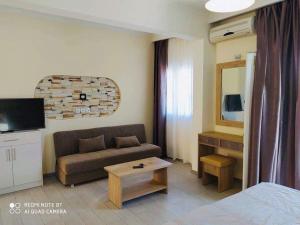 TV a/nebo společenská místnost v ubytování Moros Apartments