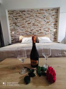 Postel nebo postele na pokoji v ubytování Moros Apartments