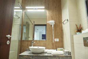 Koupelna v ubytování Stavros Hotel