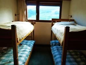 Postel nebo postele na pokoji v ubytování Penthouse Tgesa Tgampi T33 + 9 fotografií