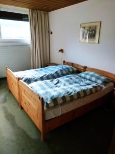 Postel nebo postele na pokoji v ubytování Penthouse Tgesa Tgampi T33
