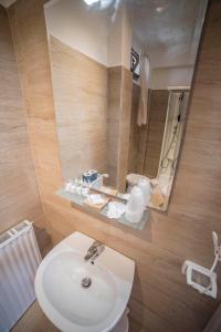Ένα μπάνιο στο Galleria Frascati Rooms and Apartment