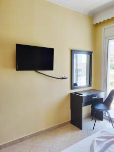 TV a/nebo společenská místnost v ubytování Atrium Luxurious Sea View Apartment