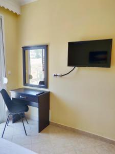 TV a/nebo společenská místnost v ubytování Atrium Luxurious Sea View Apartment