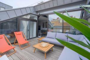 En balkong eller terrasse på NOCNOC - Le Loft, terrasse comédie