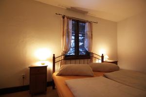 Ένα ή περισσότερα κρεβάτια σε δωμάτιο στο Apartment Chalet Kladska +52 φωτογραφίες