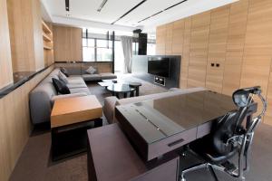 TV a/nebo společenská místnost v ubytování He-Jia Hotel