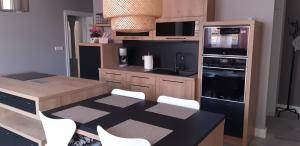 A kitchen or kitchenette at Flat Jindrichuv Hradec