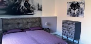 A bed or beds in a room at Flat Jindrichuv Hradec