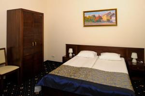 Postel nebo postele na pokoji v ubytování Boutique Hotel Villa P