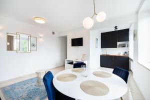 Kuchyňa alebo kuchynka v ubytovaní Riverside Apartment Targ Rybny