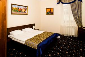 Postel nebo postele na pokoji v ubytování Boutique Hotel Villa P