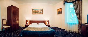 Postel nebo postele na pokoji v ubytování Boutique Hotel Villa P