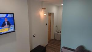 Telewizja i/lub zestaw kina domowego w obiekcie Bastówka Apartamenty