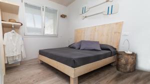 Postel nebo postele na pokoji v ubytování MARINA PONENTE